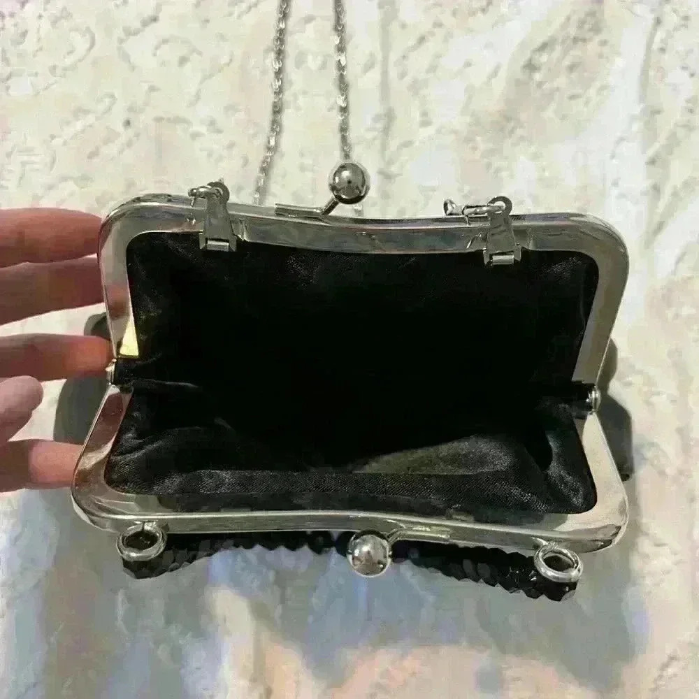 Purse perfect for a wedding or date night. Black with silver accents. - Picture 5 of 8